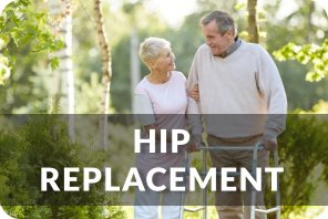 Senior woman holds the arm of a senior man as he walks with the help of a walker. They are looking at each other and smiling. Title reads: Hip Replacement